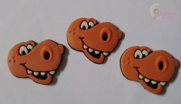Aplique Mini Carinha Dinossauro de borracha - pct c/10 unid
