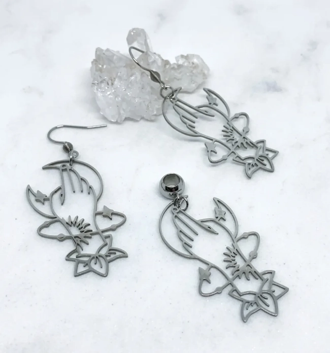 Conjunto Brincos e Pingentes Esotéricos em Aço Inox