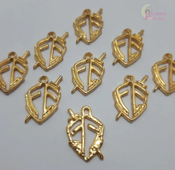 Pingente Escudo Fé de Metal Dourado - Pct C/10 Unid