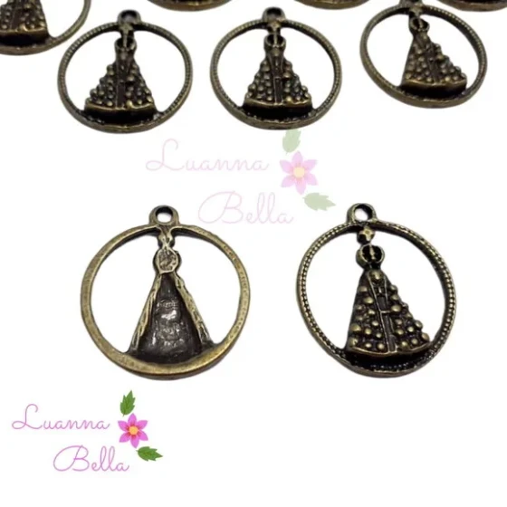 Pingente N. S. Aparecida cor ouro velho 2,8cm Pct C/10 unds