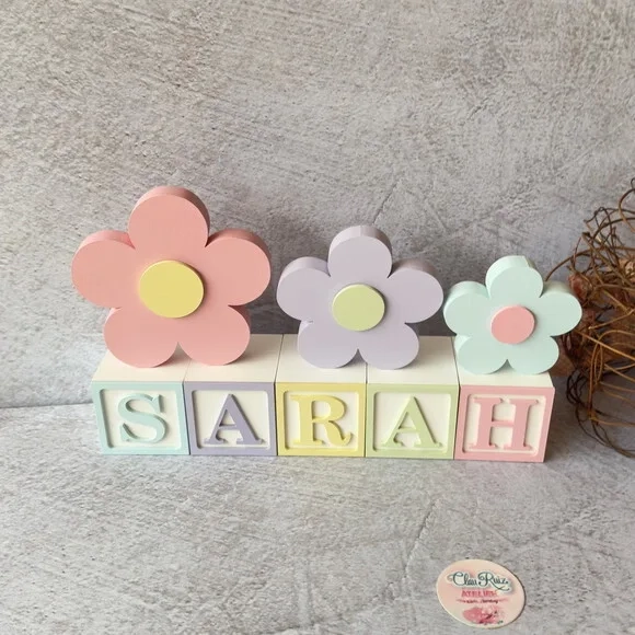 Tons Pastel Cubos 6x6cm e Trio de Flor Decoração Bebê