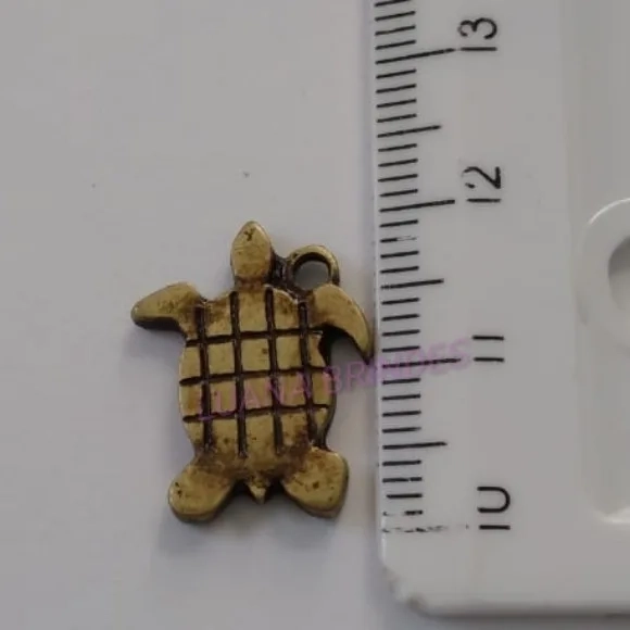 Pingente Tartaruguinha de Metal Ouro Velho - pct c/10 unid
