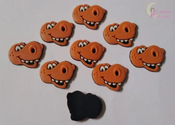 Aplique Mini Carinha Dinossauro de borracha - pct c/10 unid