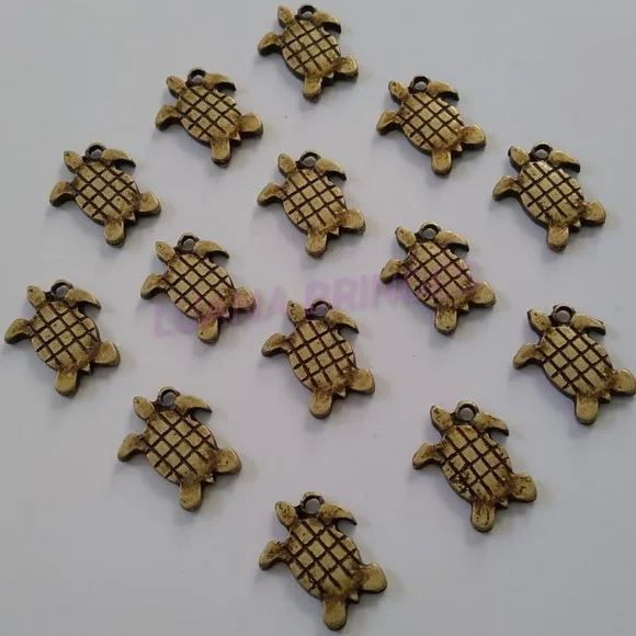 Pingente Tartaruguinha de Metal Ouro Velho - pct c/10 unid