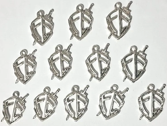 Pingente Escudo Fé de Metal Dourado e Prata Pacotes com 10 U